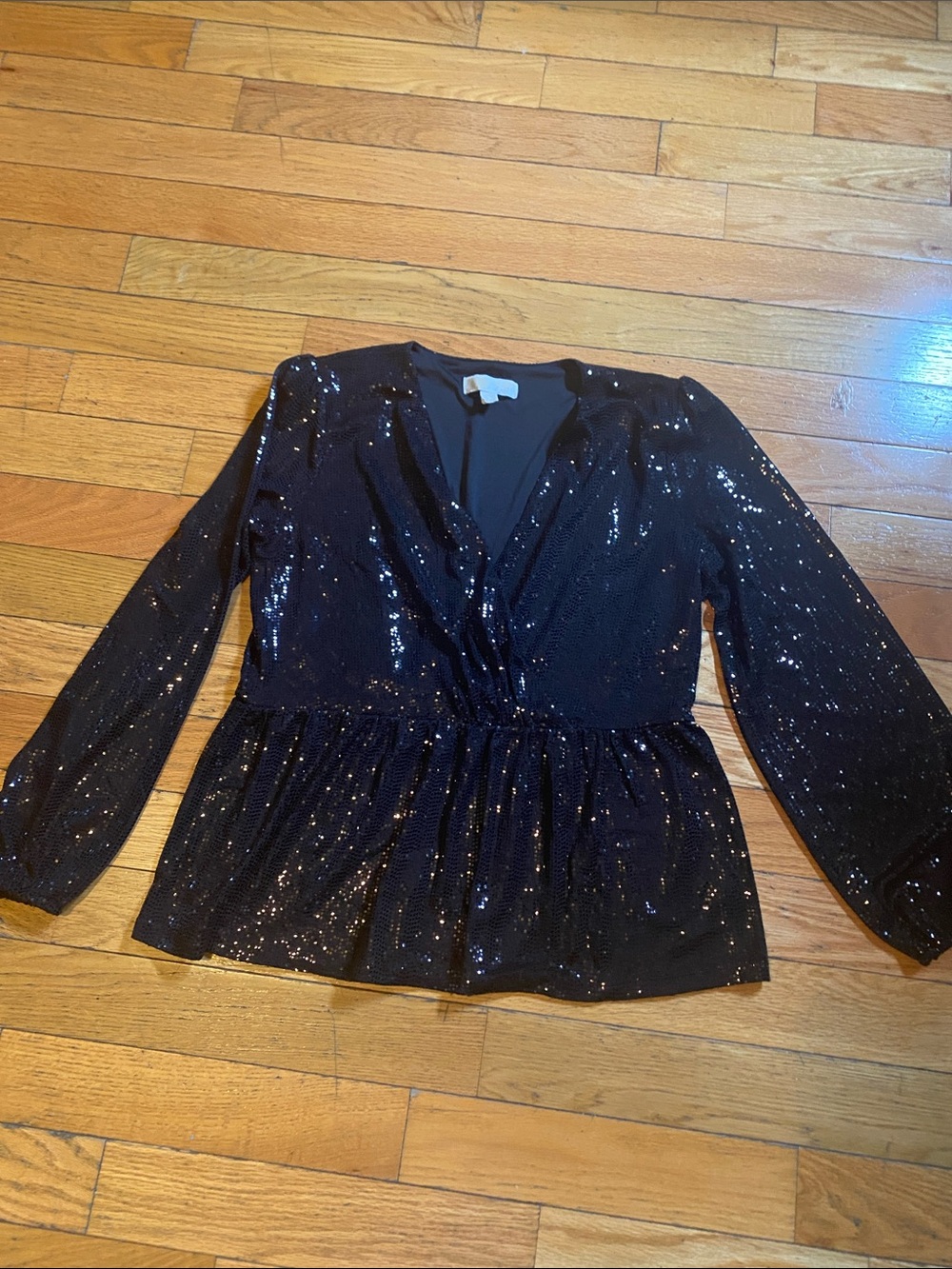 Black Sequin Wrap Peplum Top